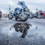 Dallas motorcycle attorney riding in the rain spring weather