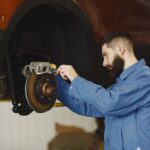 Checking the brakes on a semi truck - Dallas area truck wreck lawyer